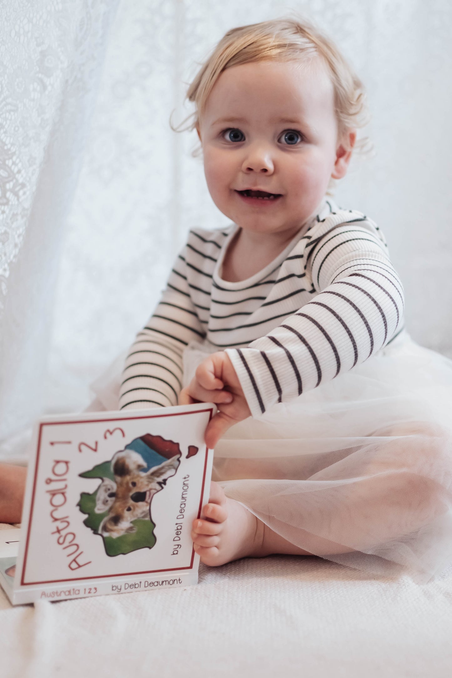 Young child reading Australia 123 Board book