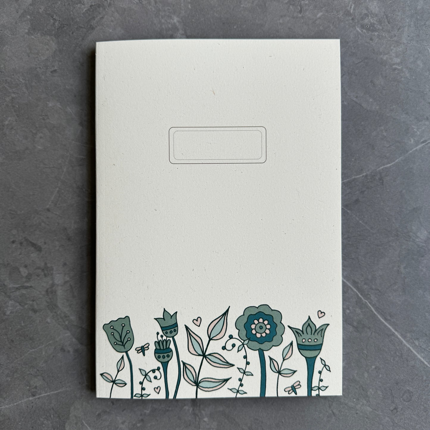 Floral note books in teal