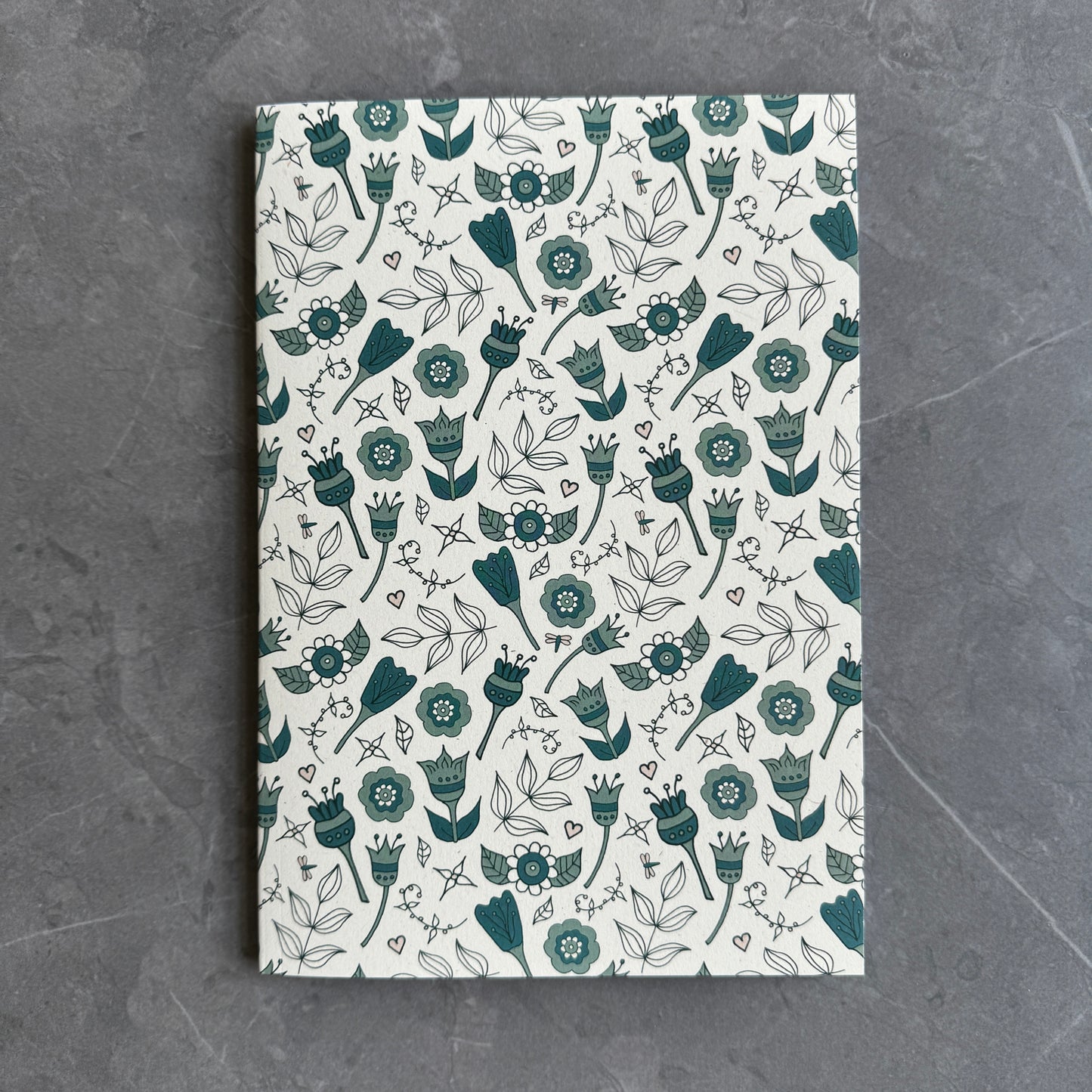 Floral note books in teal