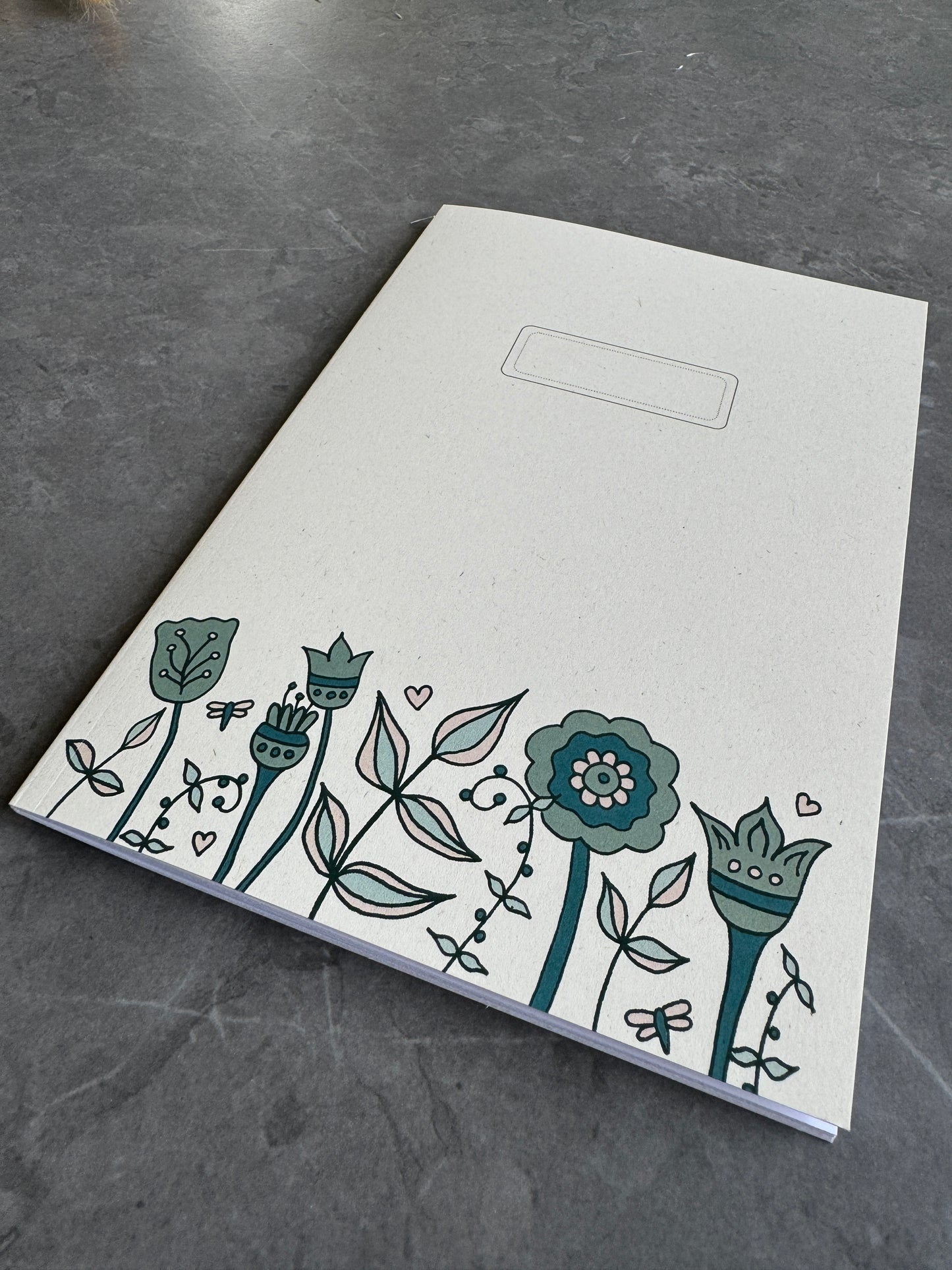 Floral note books in teal
