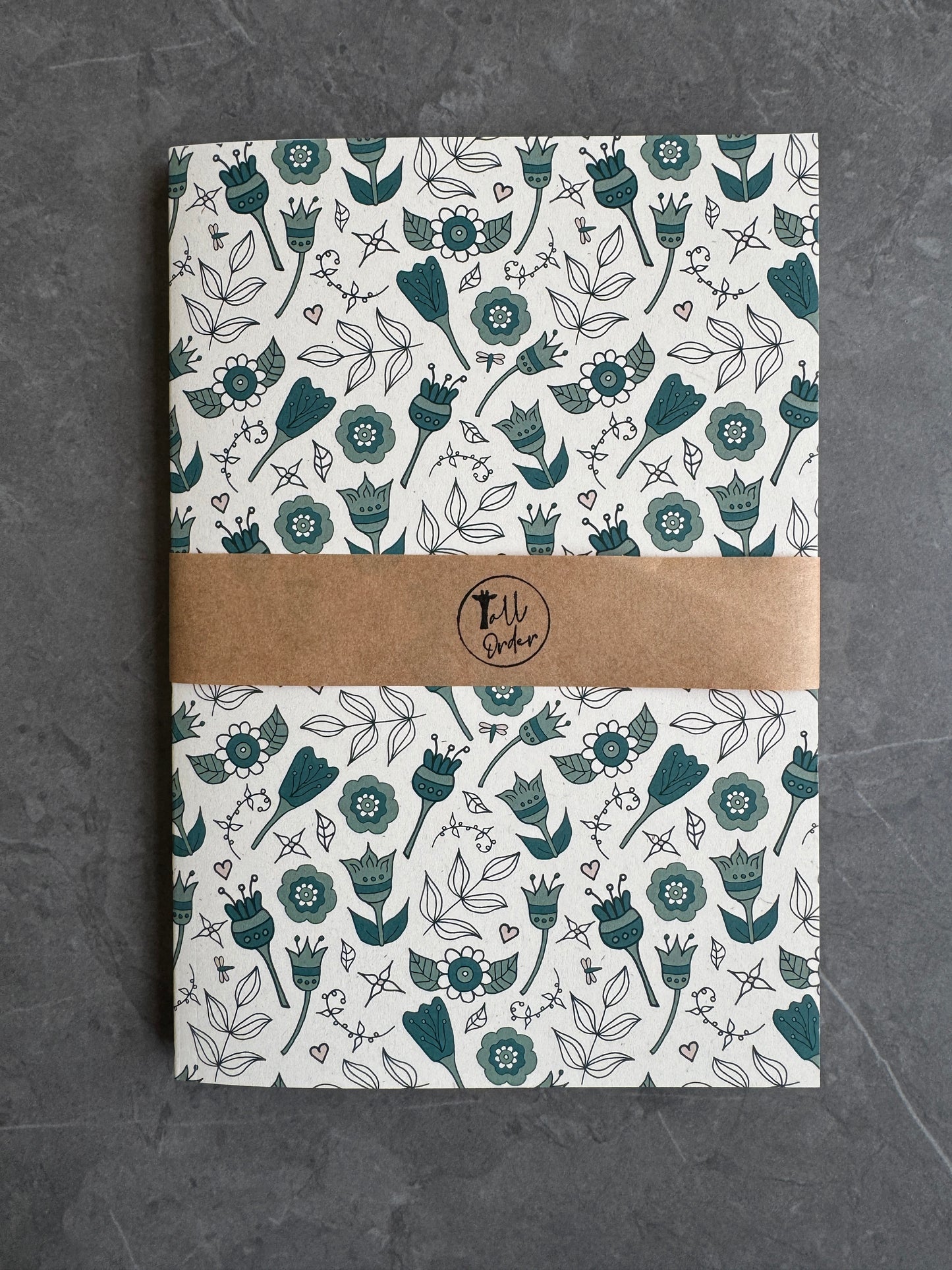 Floral note books in teal
