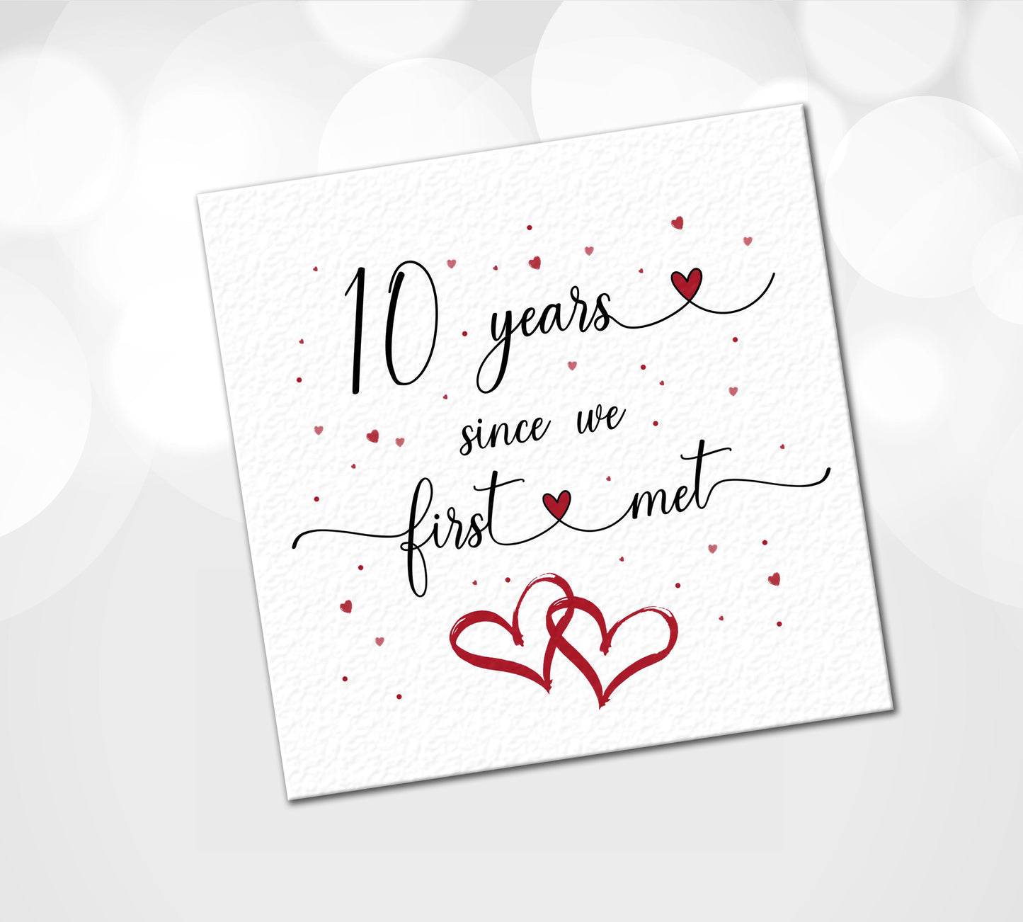 Since we met anniversary card illustrated with love hearts.  Can be personalised with number of years