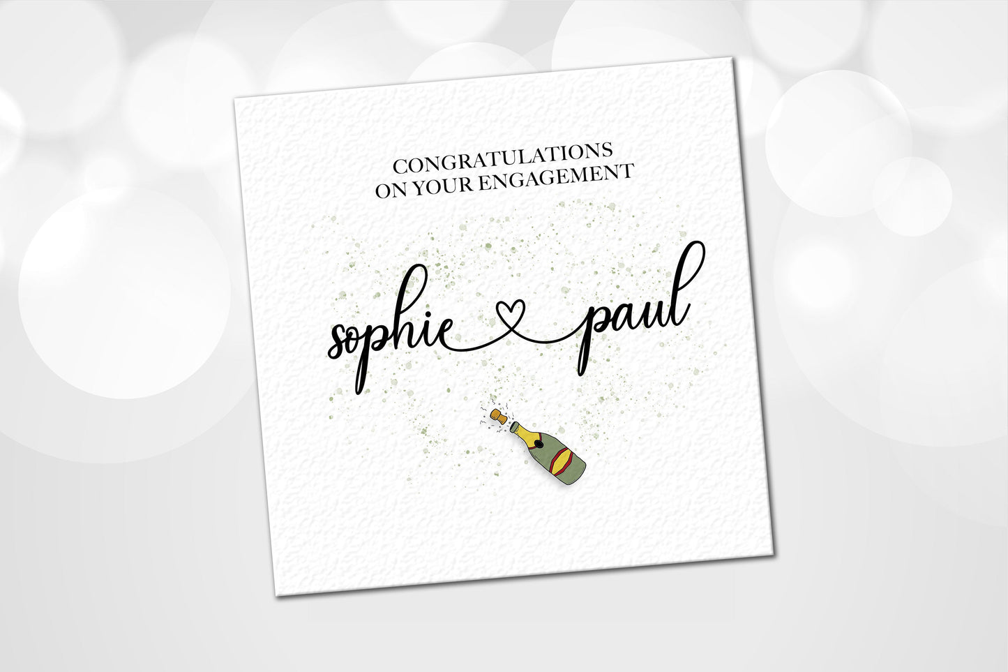 personalised engagement card in minimalist style with champagne illustration, available from the UK